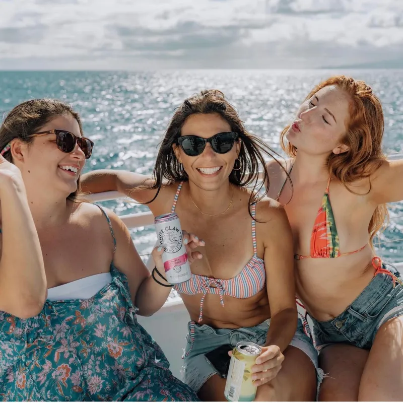 a couple of people that are standing in the water