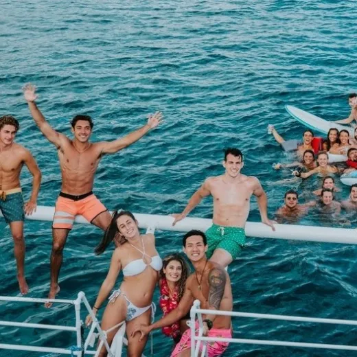 a group of people swimming in a body of water