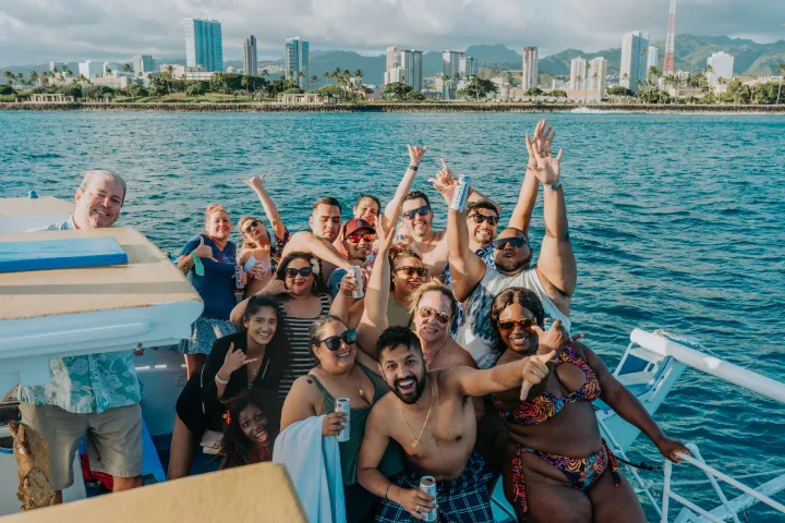 a group of people swimming in a body of water