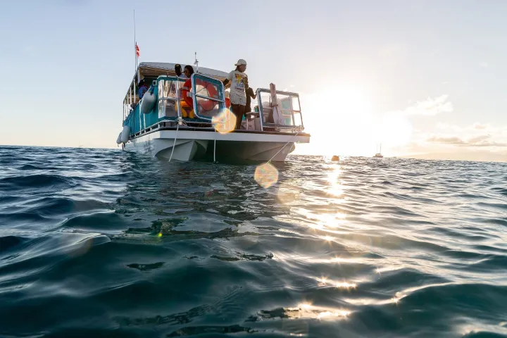 a small boat in a body of water