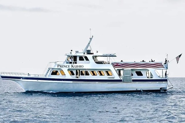 a small boat in a large body of water