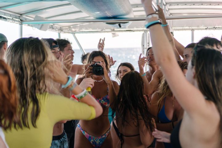 a group of people taking a selfie