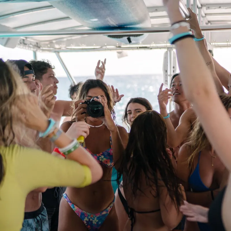 a group of people taking a selfie