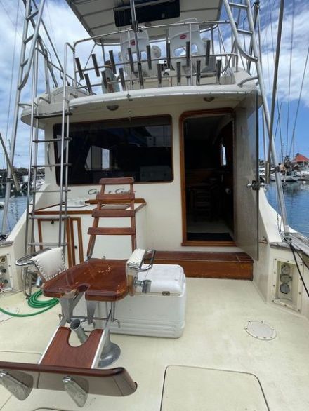 a boat is docked next to a body of water