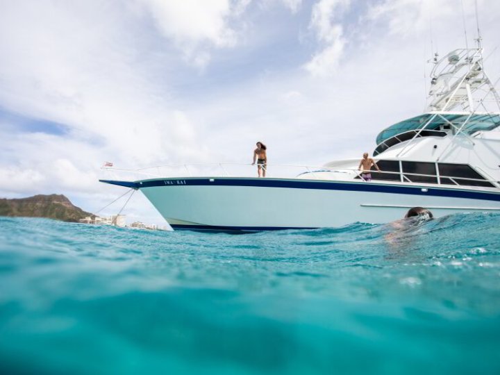 a small boat in a body of water