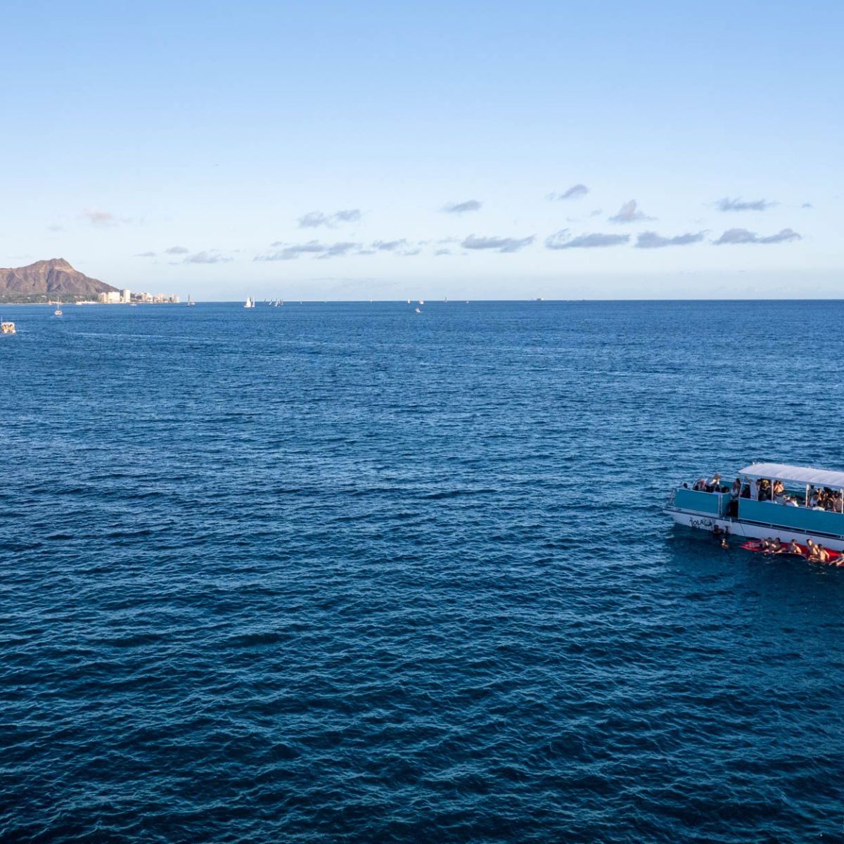 a small boat in a large body of water