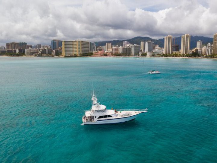 a small boat in a large body of water