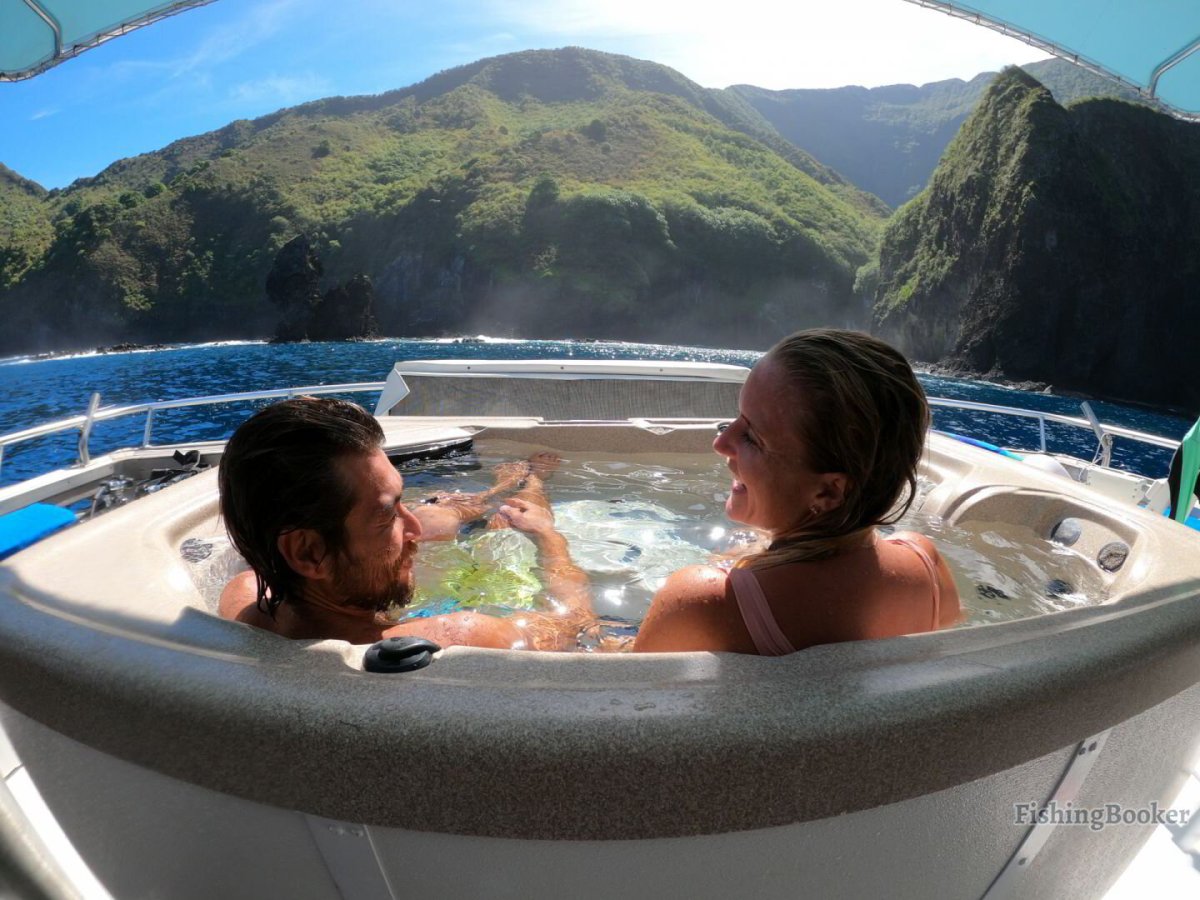 a young girl riding a wave on top of a mountain