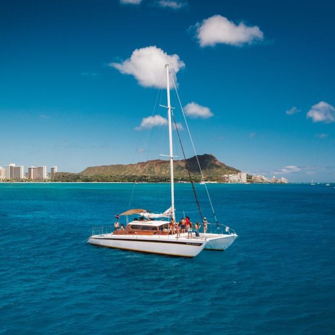 a small boat in a large body of water